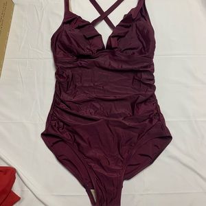 Womens burgundy one piece suit. Large. Kona Sol.